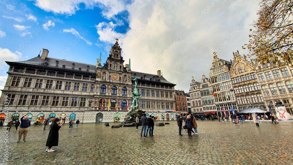 Grote markt Antwerp Belgium with Brabo fountain and city hall