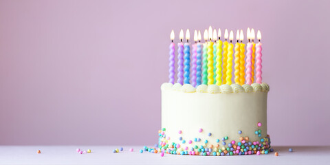 Rainbow birthday cake with candles