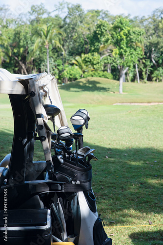 Partial close-up of a golf car with golf club heads in the bag in Playa del Carmen, Mexico