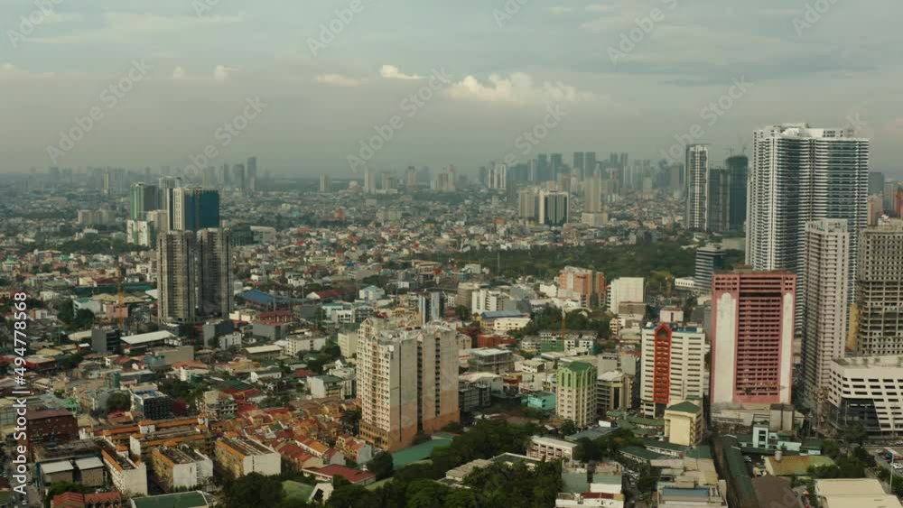 Cityscape of Makati, the business center of Manila. Asian metropolis with skyscrapers view from above. Travel vacation concept. Cityscape of Makati, the business center of Manila. Asian metropolis with skyscrapers view from above. Travel vacation concept.