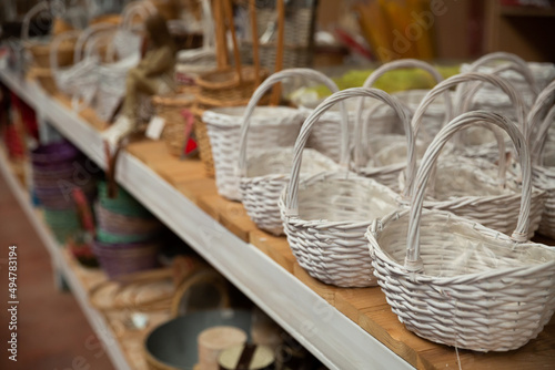 Variety of original decorative handicraft wicker baskets on sale in store..