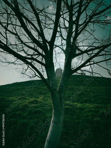 Glastonbury Town, old castle ruins, and Glastonbury Tor. English County in Somerset.