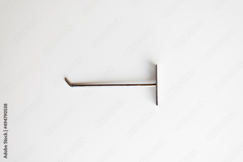 Wall stainless steel hook on isolated white background Wall stainless steel hook on isolated white background