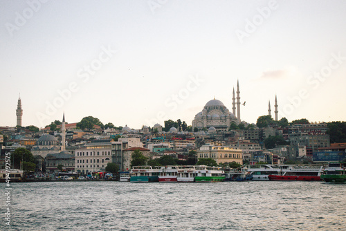 Panoramic photo taken from the river to the Blue Mosque at sunset in Istanbul Turkey © Alex Wolf 