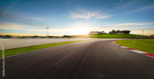 Sunset motion blurred race track. © Image Craft
