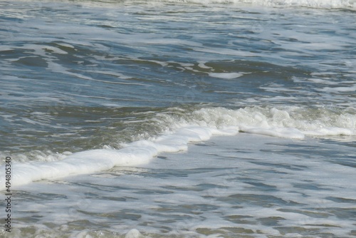 Ocean water background on Florida beach © natalya2015