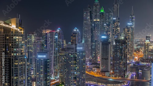 Wallpaper Mural View of various skyscrapers in tallest recidential block in Dubai Marina aerial night timelapse Torontodigital.ca