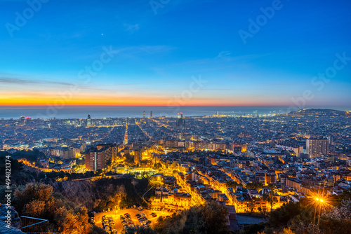 The skyline of Barcelona in Spain before sunrise