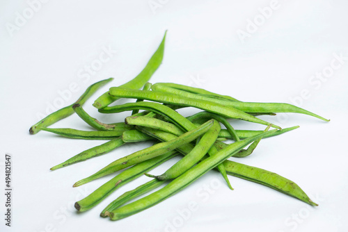 Guar or cluster bean in white background, Satara, Maharashtra, India photo
