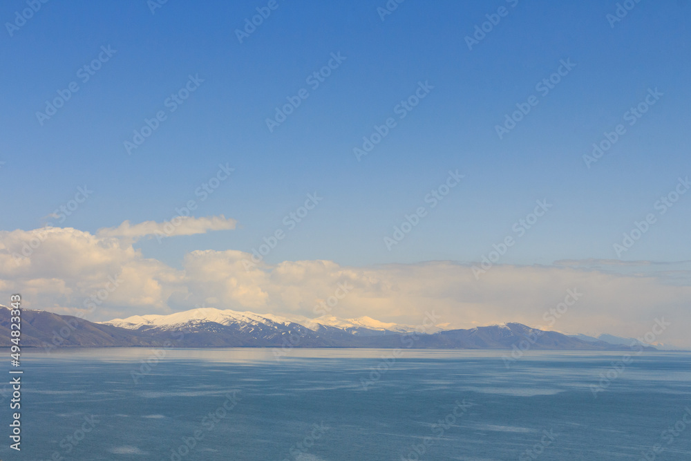 View of Lake Sevan and the snow-capped peaks around it in Armenia. View of Lake Sevan and the snow-capped peaks around it in Armenia.