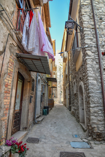 A narrow street among the old stone houses of Taurasi  town in Avellino province  Italy.