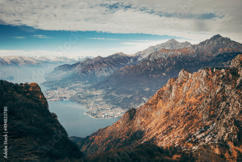 sunset in the mountains over lake como in italy