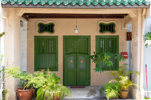 Singapore shophouse door green photo