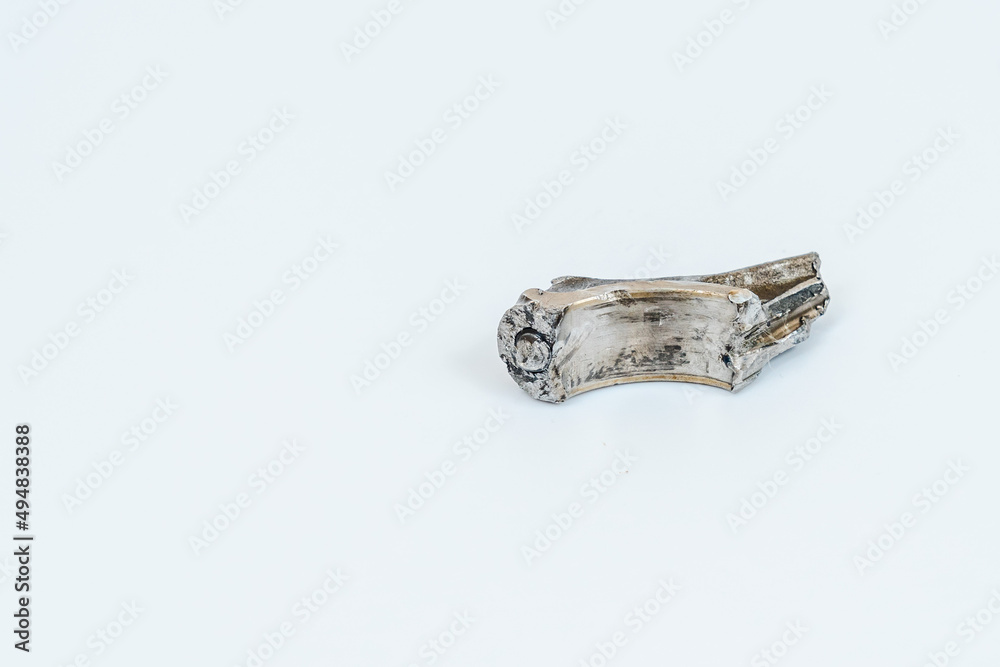 Broken engine piston isolated on white background Broken engine piston isolated on white background