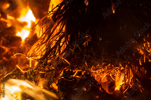 Close up view of flames. Sparks from the bonfire