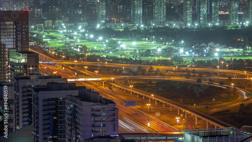 Canvas Print Dubai luxury residential district with golf club night timelapse.