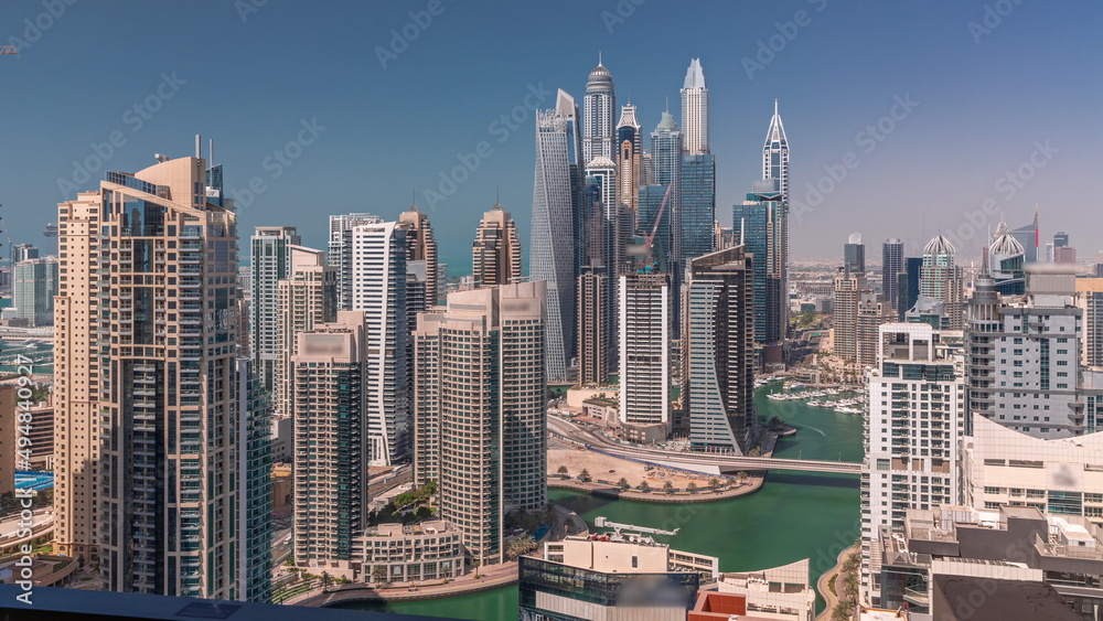 View of various skyscrapers in tallest recidential block in Dubai Marina aerial timelapse View of various skyscrapers in tallest recidential block in Dubai Marina aerial timelapse