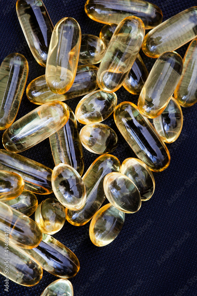 Studio shot of soft gel omega fatty acid capsules, a daily nutritional supplement
