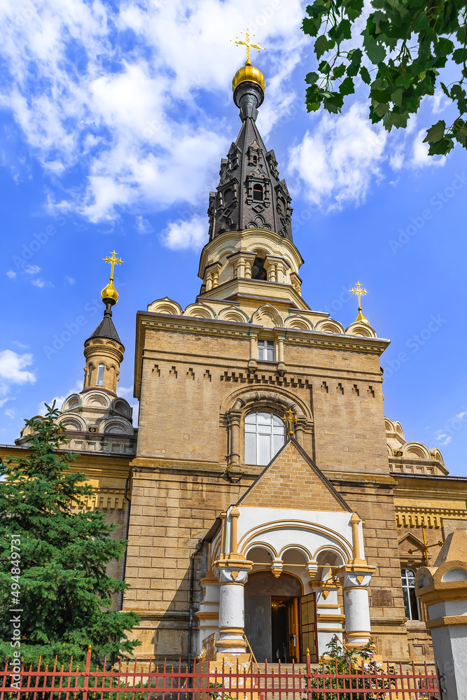 Mykolaiv, Ukraine - July 26, 2020: The building of the Cathedral of the Kasperovsky Icon of the Mother of God in Mykolaiv. Beautiful architecture of the Ukrainian Orthodox Church, vertical