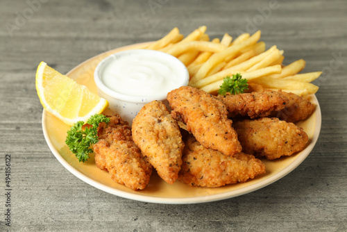 Concept of tasty food with Chicken strips, close up