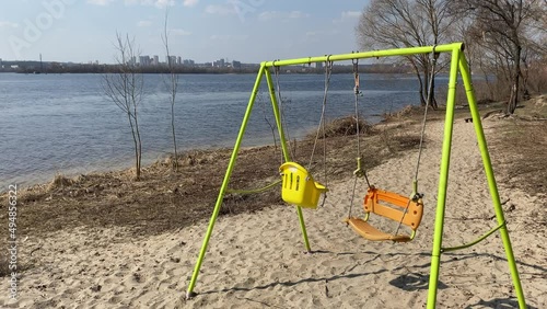 Swing on the bank of Dnipro river in Kyiv, Ukraine