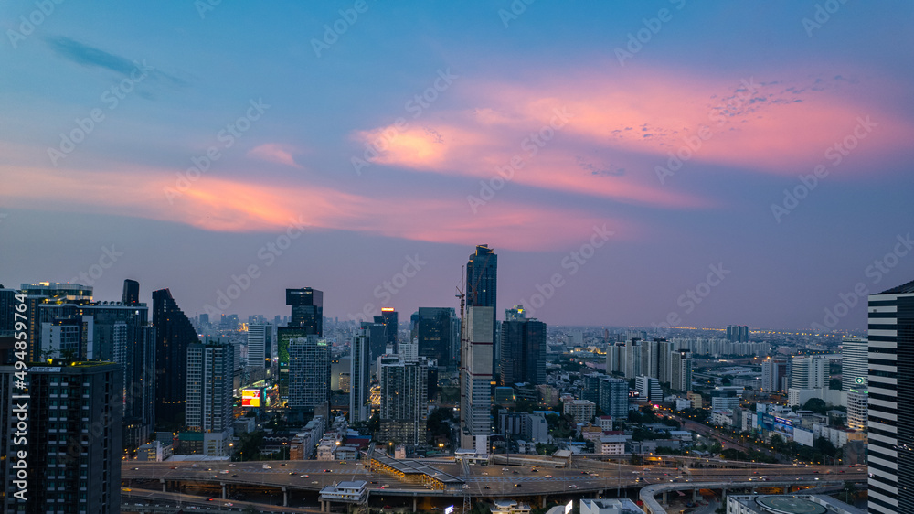 aerial view cityscape concept or abstract of advanced innovation, Majestic sunset or sunrise landscape of City scape and Business District, financial technology, energy power	
