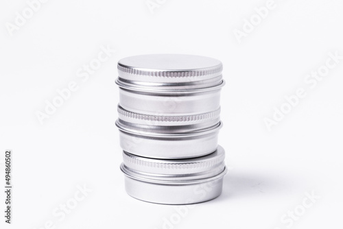 Set of silver tin metal boxes, cases. on white background