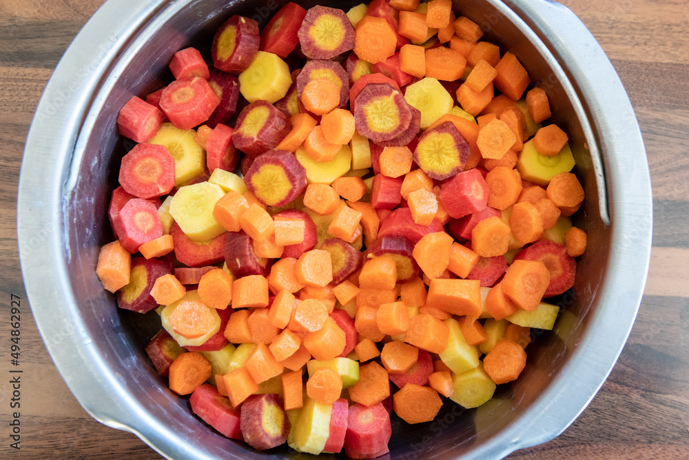 Varieties of carrots cut in an aluminum dish Varieties of carrots cut in an aluminum dish