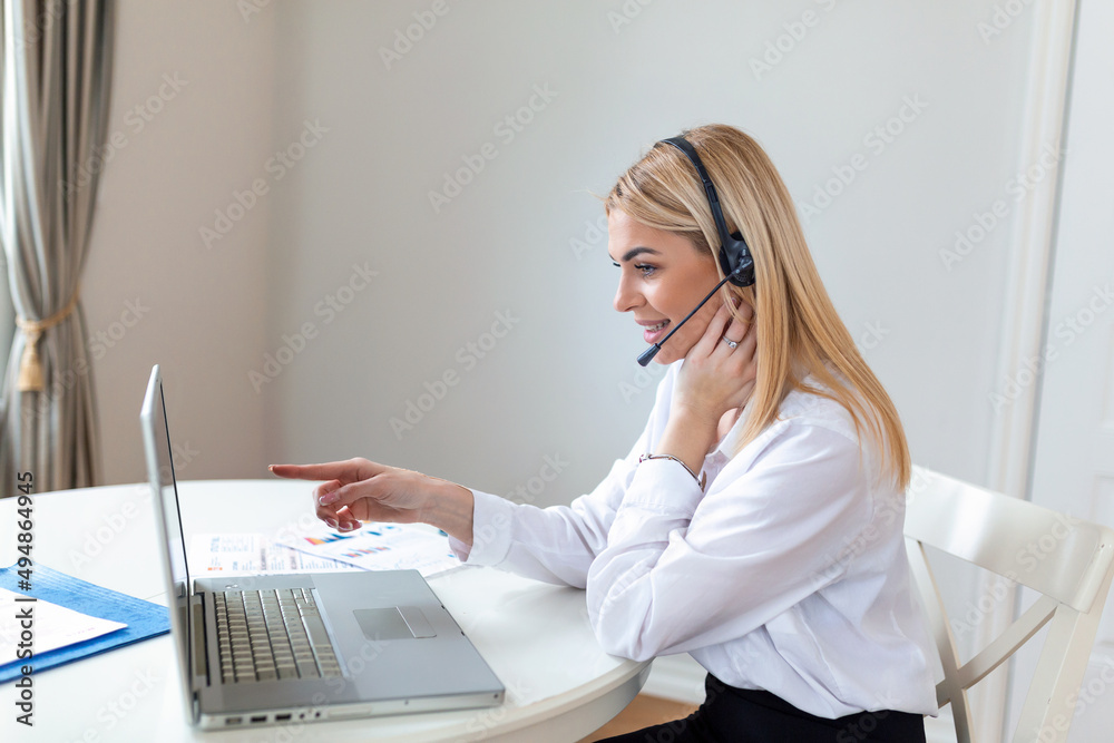 Young friendly operator woman agent with headsets. Beautiful business woman wearing microphone headset working in the office as a telemarketing customer service agent, call center job concept. Young friendly operator woman agent with headsets. Beautiful business woman wearing microphone headset working in the office as a telemarketing customer service agent, call center job concept.