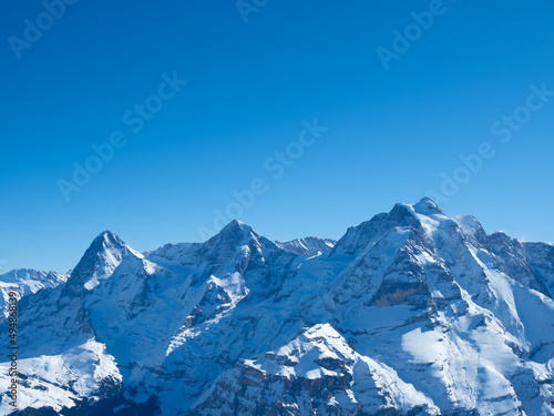 Winter view from Schilthorn peak, Switzerland, towards the famous mountains Eiger, Moench, and Jungfrau © Thomas