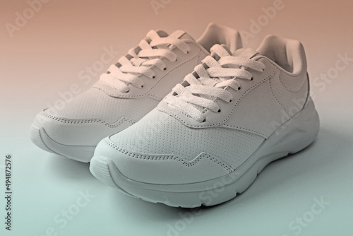 Sport trainers for jogging on white background closeup