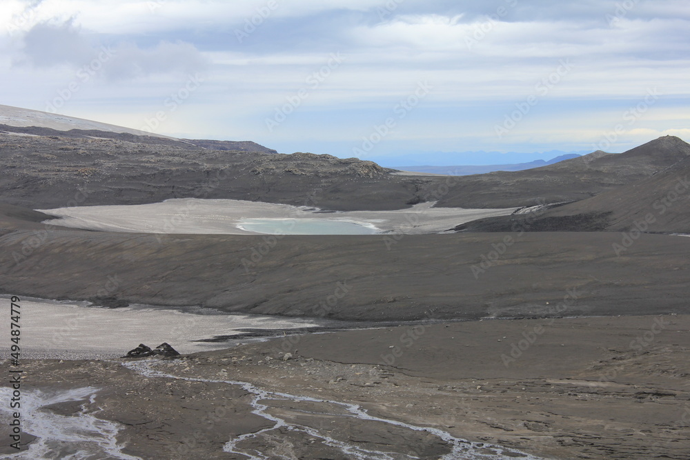 Obraz premium Dramatic and surreal lava and glacier landscape, concept: elements, power of nature, Earth formation (horizontal), Fimmvorduhals, Iceland