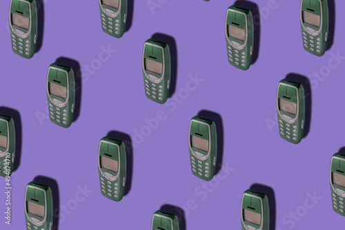 Vintage cellphone pattern. Minimal mobile phone concept. Old technology