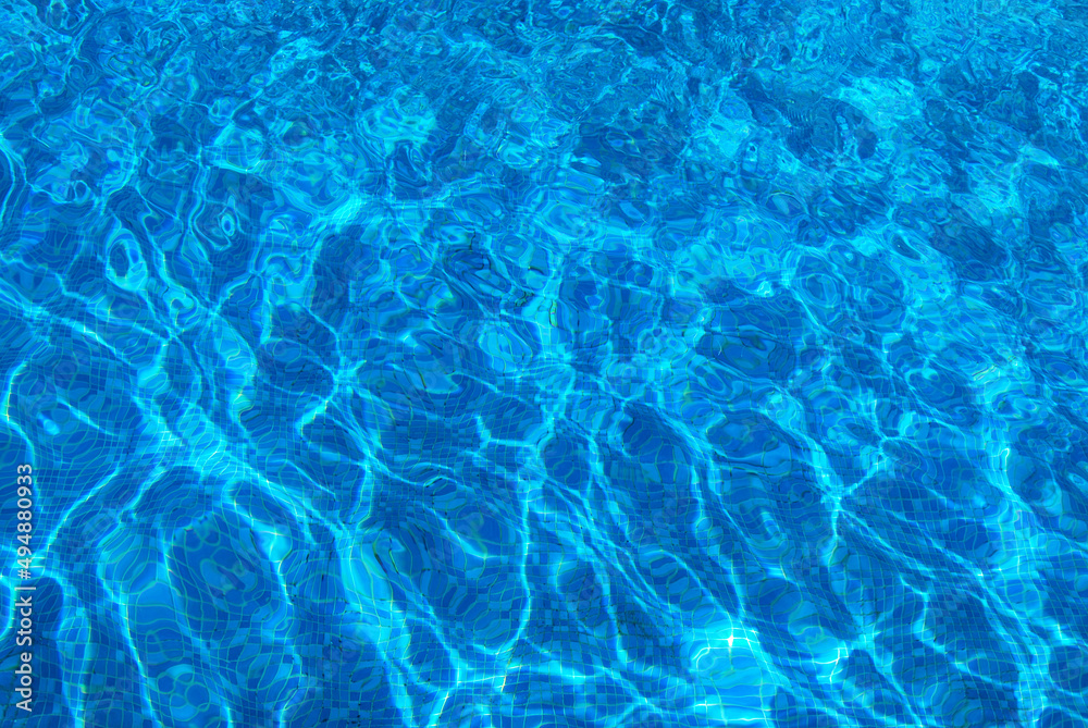 	
Clear water surface, rippled water in tiled swimming pool