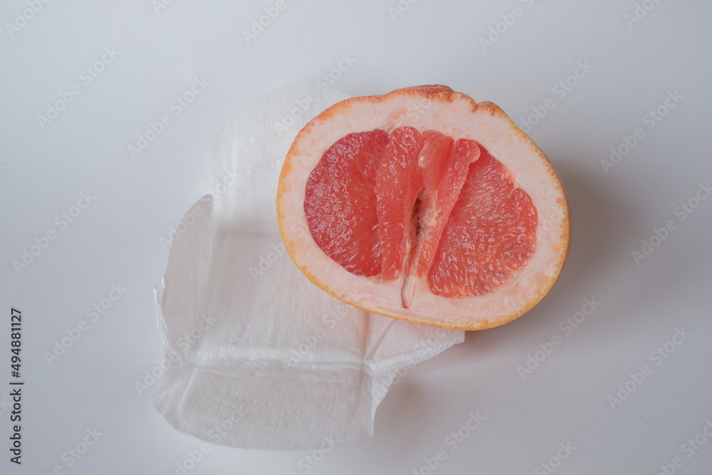 Stockfoto vulva, clitoris and labia symbol. Grapefruit looks like a