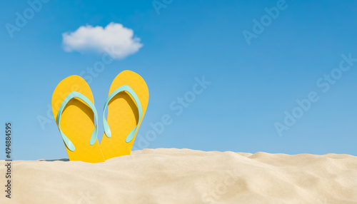 flip flops on beach sand with a cloud overhead photo