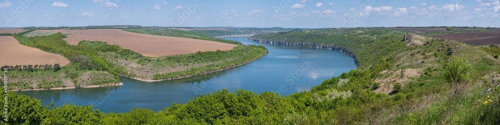 Amazing spring view on the Dnister River Canyon with picturesque rocks, fields, flowers. This place named Shyshkovi Gorby,  Nahoriany, Chernivtsi region, Ukraine.