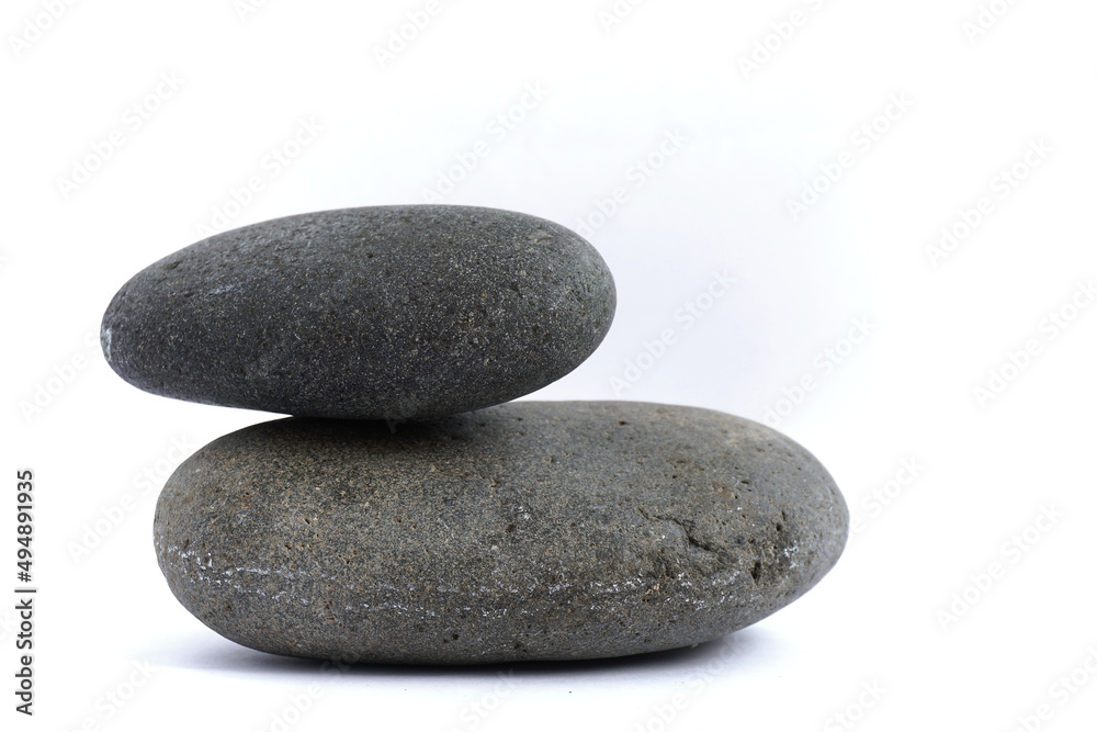 Two large shaped stones on a white background. Two large shaped stones on a white background.