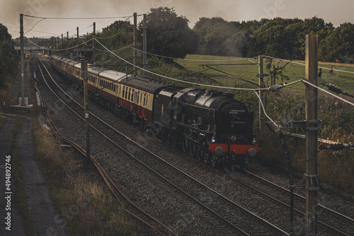 High angle shot of a steam train on the West Coast Trainline in the UK photo
