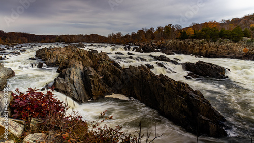 Beautiful shot of a flowing rocky stream in Great Falls National Park, Fairfax County, Virginia photo