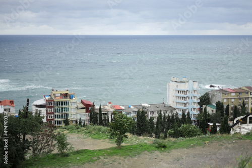 Panoramic view of the sea coast. Hotels and inns by the sea, tourist season. Republic of Crimea, Black Sea. Holidays in the South