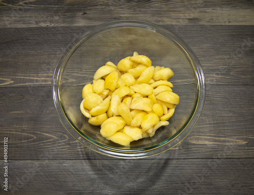 Loquats cut into pieces for making loquat jam.