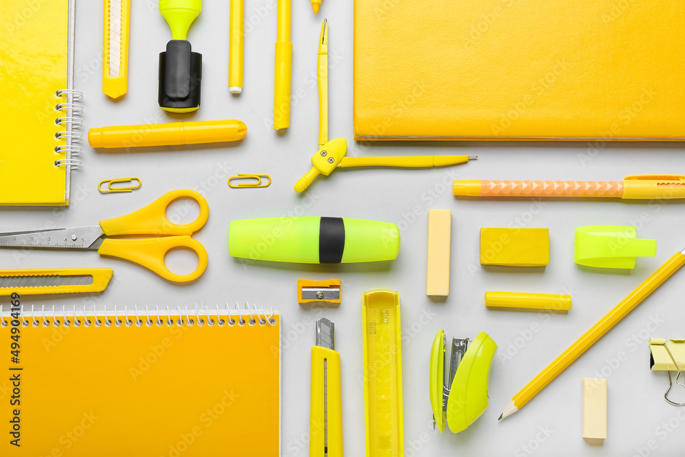 Set of yellow stationery on grey background Stock Photo | Adobe Stock