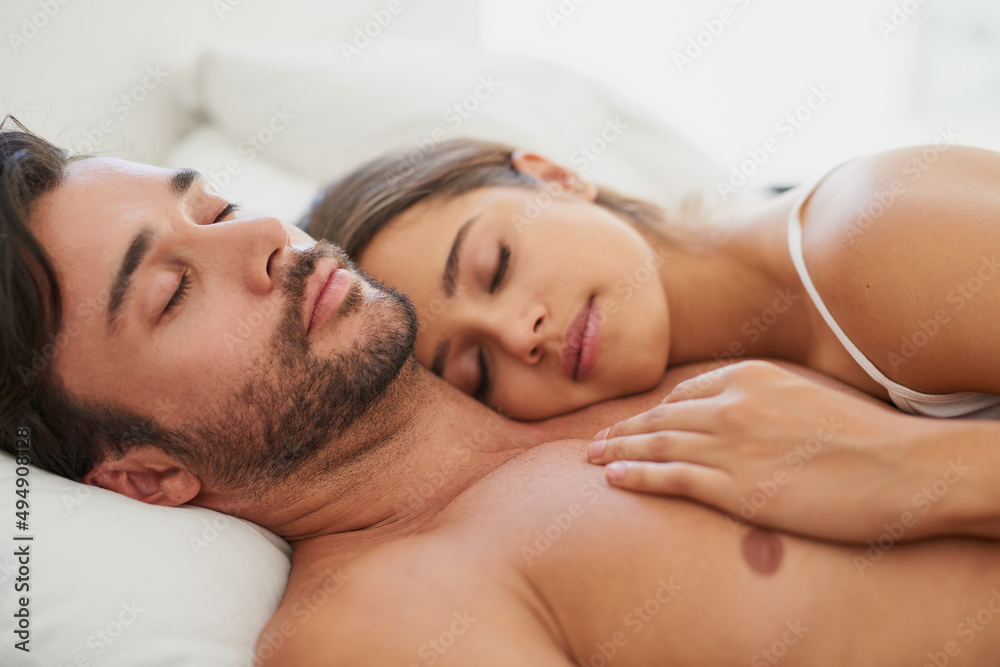 Who needs a teddybear when youve got each other. Shot of a young couple sleeping comfortably in bed. Who needs a teddybear when youve got each other. Shot of a young couple sleeping comfortably in bed.