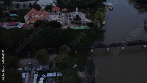 Aerial view of River Khwae Bridge and buddhist temple in Kanchanaburi, Thailand photo