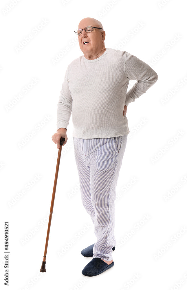 Senior man with walking stick suffering from back pain on white background Senior man with walking stick suffering from back pain on white background