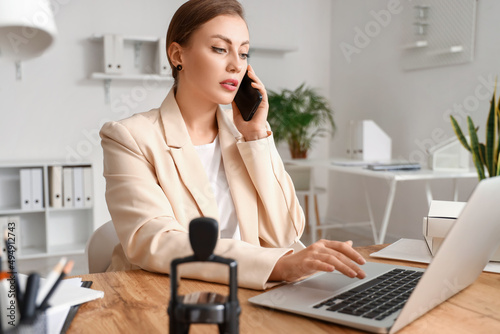 Female notary public talkin...