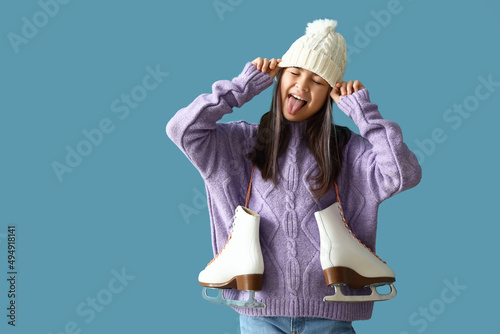 Little Asian girl in warm c...