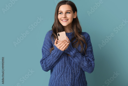 Beautiful young woman with ...