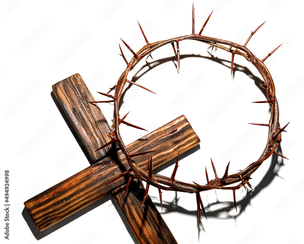 Crown of thorns with wooden cross on light background Crown of thorns with wooden cross on light background